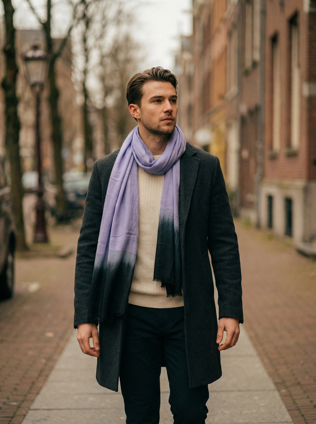 Man wearing Violet Moroccan Tagelmust as a breathable desert headscarf, lightweight travel scarf built for wind and dust protection.