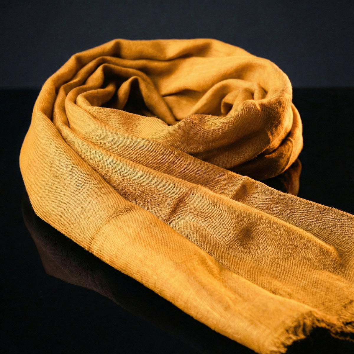 Lightweight Original Sunglow Orange Tagelmust crafted in sustainably sourced rayon fabric, breathable Moroccan desert headscarf designed for Sahara travel, safari protection, and hot climate exploration.