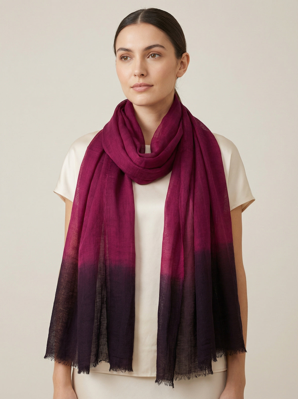 Amaranth purple Tagelmust styled as a lightweight travel scarf for women, Touareg inspired Moroccan headscarf ideal for safari adventures and warm desert climates.