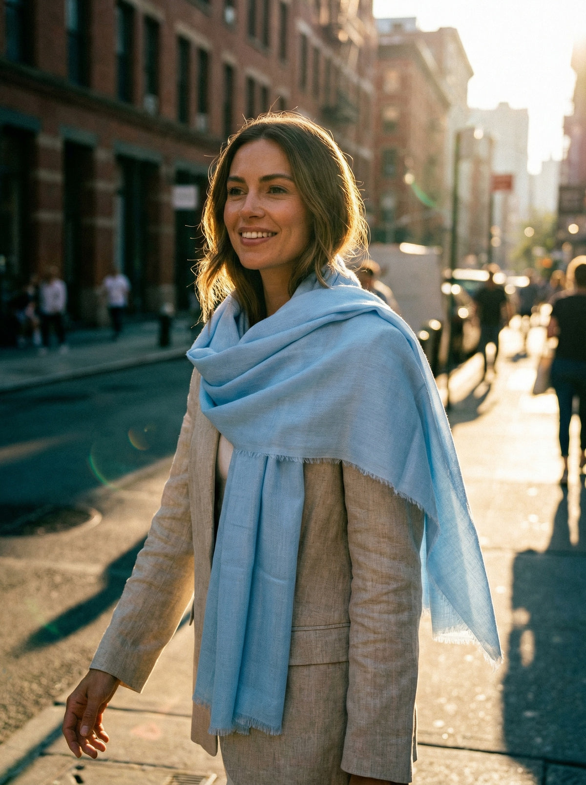 Light sky blue Tagelmust styled as a lightweight safari scarf for women, Touareg inspired Moroccan travel shawl for sun protection.