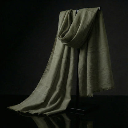 Lightweight Dark Moss Green Tagelmust in sustainably sourced rayon, designed as a breathable Moroccan desert headscarf for safari and hot climates.