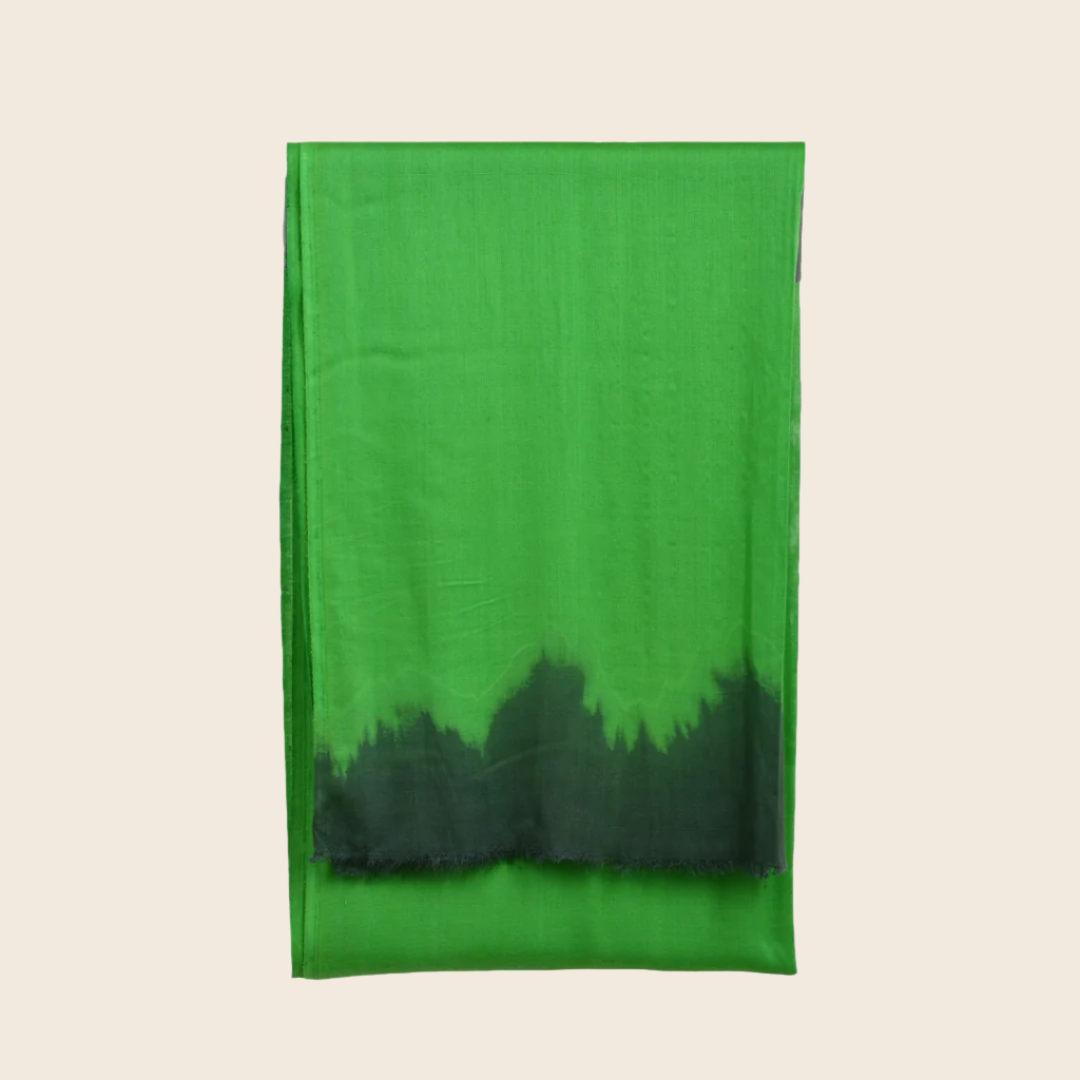 Keppel Green Soaked Tagelmust scarf – vibrant emerald green fading to deep forest‑black, sustainably sourced lightweight Moroccan headscarf ideal for nomadic travelers seeking green scarves for hot weather and dry climates.